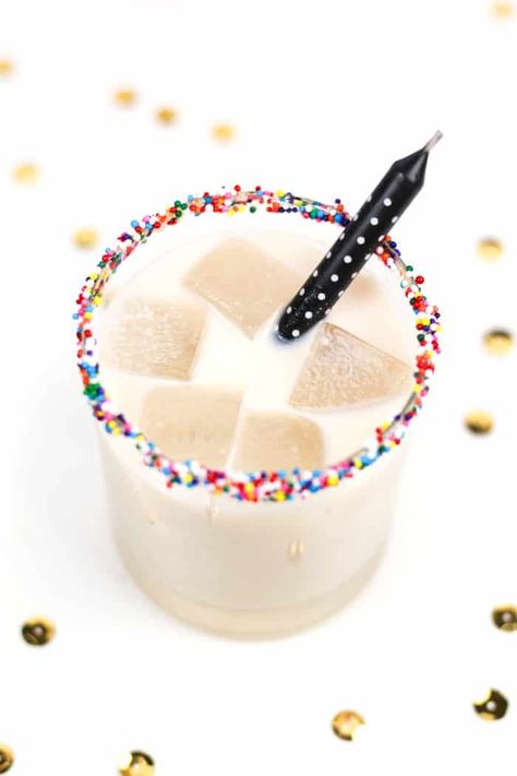 Celebrating another year? Blow out your candles, make a wish and take a sip of a Birthday Cake White Russian! With extra sprinkles on the rim and a birthday candle cocktail stirrer, of course. (via feastandwest.com) Candle Cocktail, Birthday Cocktails Recipes, Frozen Drink Recipes, White Chocolate Liqueur, New Years Cocktails, Champagne Recipes Cocktails, Frozen Cocktail Recipes, Birthday Cocktails, Cake White