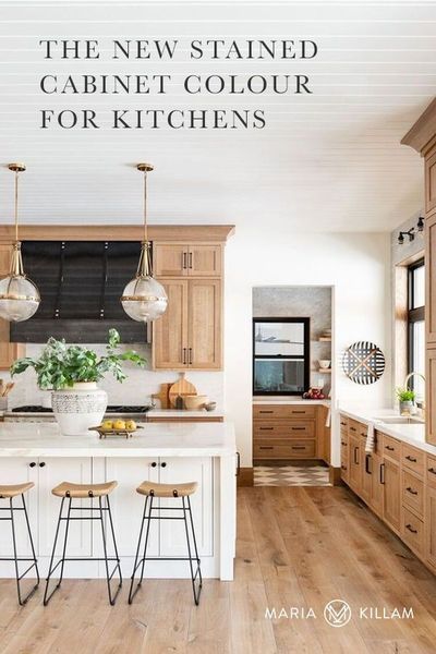 Renovating your kitchen or bathroom this year? There�s a new kitchen cabinet trend and it isn�t paint – it�s a new wood stain colour. See my take on this new stained cabinet trend and how to make it work with a white kitchen. Mcgee Kitchen, Model Dapur, Natural Wood Kitchen, Latest Kitchen Designs, Light Wood Cabinets, Interior Boho, Kabinet Dapur, White Kitchen Island, Staining Cabinets