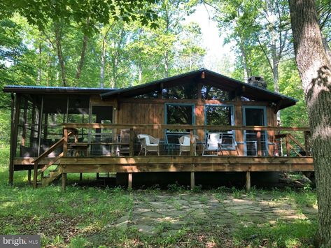 1975 Custom WaterFront Cabin For Sale on 5.4 Acres West Virginia $325,000 - Country Life Dreams Bayou House, Outdoor Wood Burner, Ranch Farmhouse, Waterfront Cabins, Stone Fireplace Surround, Life Dreams, Cabins For Sale, Brick Ranch, Virginia Homes