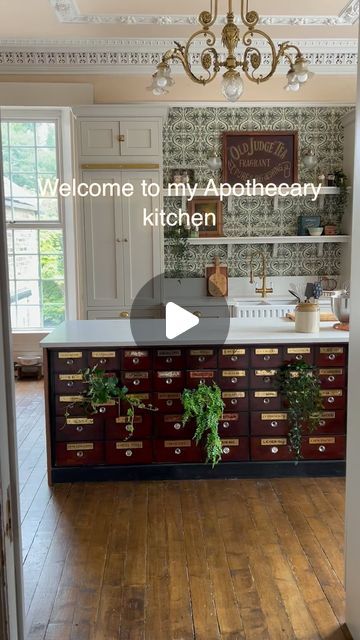 Helena Garcia on Instagram: "Oh I do love her! The Apothecary kitchen was in my mind even before we found this house. The kitchen is the most important room in the house for me and even though this room was originally the dining room I think it was worth the effort turning it into the kitchen. We had to open the chimney breast, add plumbing, remove carpets and wallpaper etc, but it was all well worth it.  A lot of you have asked about the apothecary drawers at the front. They are only about 30cm deep so we built the island around them. On the other side there’s open shelving full of plates, bowls etc.   #interiordesign #darkinteriors #darkacademia #victorianrenovation #victorianhouserenovation #apothecary #victorianapothecary #vintagehome #periodhome #gbbo #periodhomesofinsta" Apothecary Kitchen Island, Wallpaper Kitchen Island, Helena Garcia, Prospect Cottage, Apothecary Drawers, Modern Victorian Decor, Apothecary Kitchen, Victorian House Renovation, Flat Kitchen