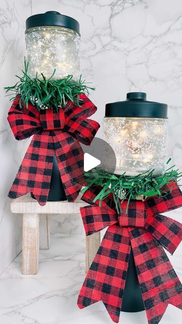 Micah Enriquez on Instagram: "Dollar Tree DIY Lanterns🎄#MakeItWithMicah   What do we think of these DIY @dollartree lanterns?  Everything is from the DT except: paint and glue. You will need:  • 2 wine glasses (large) • 2 small jar • garland • faux snow/glitter (optional)  • small bows • twinkle lights/faux tea lights   Happy Crafting! 💖💖💖   If you found value ➡️ ✨Like ✨Comment✨ Share✨Save✨ (it really helps my page a lot 💖). Hit the notifications 🔔 so you never miss a thing 💖     #dollartree #dollartreediyer #crafty #christmasdecor #christmasdiy #farmhouse #farmhousechristmas #farmhousedecor #manualidades #dollartreediy #diyreels #hacks #diymama #diyhacks #mominfluencer #christmasdecor #dollartreechristmas  #dollartreehaul #dollartreediy #giftideas #christmasdiy #christmas #craftree Diy Dollar Tree Christmas Lantern, Bows On Lanterns Christmas, Christmas Candle Lanterns, Decorating Lanterns Ideas, Dollar Tree Lanterns Diy, Christmas Lanterns Decorated Diy, Diy Christmas Lanterns Ideas, Christmas Lanterns Decorated, Christmas Lantern Ideas