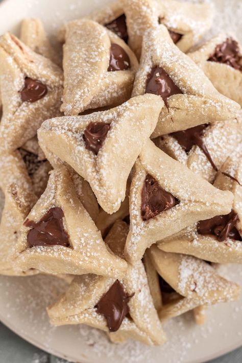 Delicious, melt in the mouth traditional hamentashen Purim cookie recipe. An easy one-bowl shortbread cookie recipe great for Purim and holiday cookie gift |#purimrecipe #purimcookies #hamentashen #hamentashenrecipe #easyhamentashen #springbaking #cookies #nutellscookies #shortbreadcookies| Easy Hamentashen Recipe, Hamentashen Recipe, Purim Recipe, Holiday Cookie Gift, Spring Baking, Shortbread Cookie Recipe, Cookie Gift, Shortbread Cookie, Bake Dessert