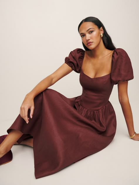 How dreamy. Shop the Davila Linen Dress from Reformation,  a short sleeve, midi dress with a sweetheart neckline, puff sleeves, and center back smocking. Short Sleeve Midi Dress, Swimwear Dress, Puffed Sleeves Dress, Sleeve Midi Dress, Fitted Skirt, Linen Clothes, Full Skirt, Online Retail, Linen Dress