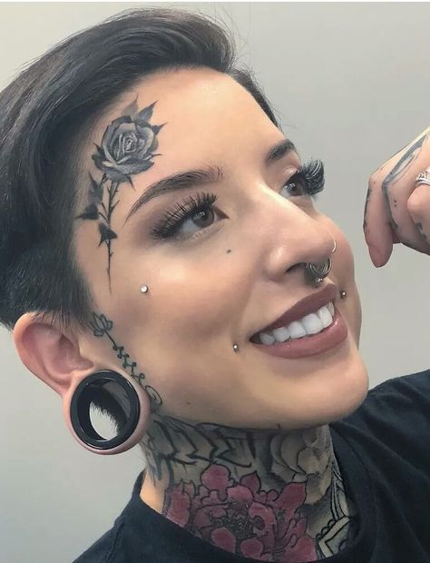 Floral neck and face tattoos with dermal accents Piercings Corps, Face Dermal, Piercing Face, Piercing Eyebrow, Face Tattoos For Women, Face Piercings, Facial Tattoos, Cool Piercings, Facial Piercings