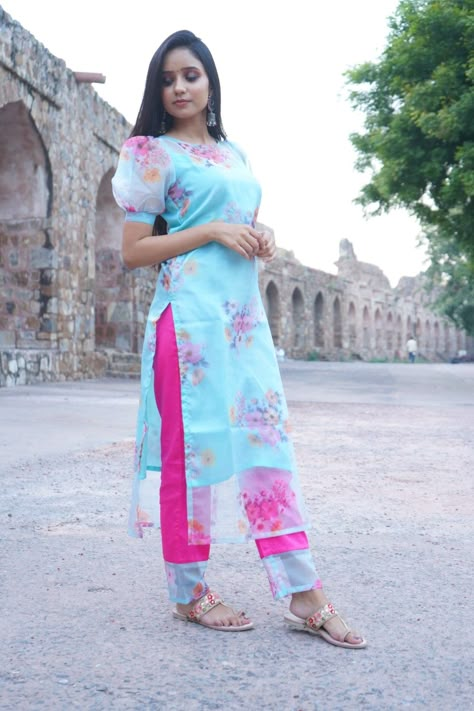 Floral print organza kurti with designer cotton pant. More prints available. DM or what's app 8745826707 to order #organza #organzasuit #organzakurti #kurtipant #pantsdesign #designer Floral Organza Kurti Designs, Organza Kurti Designs Latest, Organza Kurti Designs, Latest Pakistani Suits, Organza Kurti, Simple Frock Design, Stylish Kurtis Design, Pakistani Suits Online, New Kurti Designs