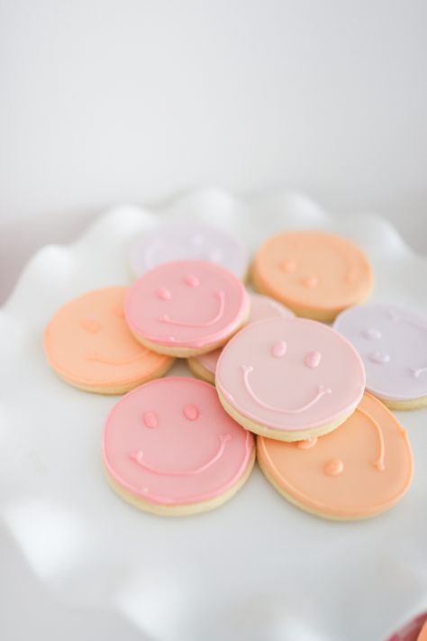 Smiley cookies that will have everyone smiling Diy Smiley Face Cookies, Smiley Cookies Decorated, Smiley Face Party Decoration, Pastel Smiley Face Birthday Party, One Happy Girl Birthday Party, Smiley Birthday Cake, Smiley Birthday Theme, Happy Face Cake, Smiley Face Cookies