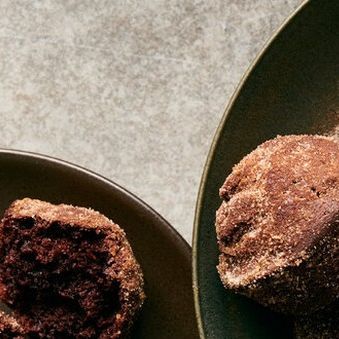 NYT Cooking on Instagram: "These supersoft, pillowy chocolate muffins are reminiscent of your favorite chocolate doughnut, but with no fussy frying necessary. Packed with sour cream and just a drop of oil, they stay moist and delicious for days." Chocolate Doughnut Muffins Nyt, Chocolate Doughnut, Doughnut Muffins, Chocolate Doughnuts, Nyt Cooking, Chocolate Muffins, Frying, Sour Cream, Holiday Cheer