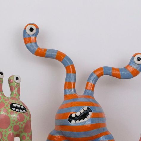 Hannah Simpson Studio on Instagram: "The monster family 👩‍👩‍👦‍👦 This collection of monsters are off to their new homes today #ceramic #ceramicart #clayart #pottery #monster #cuteart #cutesculpture" Air Dry Clay Monsters, Monster Mugs Ceramics, Clay Monsters Cute, Monster Ceramics, The Monster Family, Clay Monster, Monster Clay, Whimsical Pottery, Ceramic Monsters