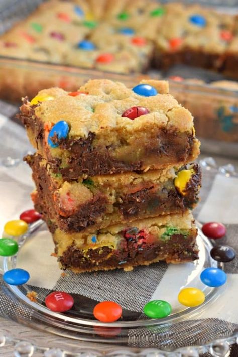 Chewy M&M's Chocolate Chip Cookie Bars are thick and delicious and perfect when you need a quick dessert. Perfect for holidays and bake sales too! Chocolate Chip M&m Cookie Bars, Cookie Bars M&m, M And M Desserts, M M Desserts, M&m Bars Recipe, M&m Cookie Bars, M M Recipes, Mm Bars, Chocolate Chip Cookie Bar