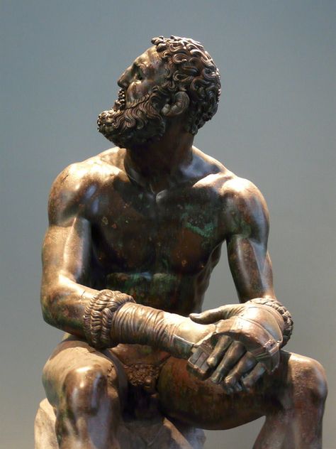 Seated Boxer a work of Lyssipus of Sikyon, a sculptor who worked for Alexander the Great, (or a work of Apollonius?, c. 225 BC ), Terme Museum Rome, Italy (Roman Copy 50 BC?). The boxer is wearing something like todays boxing gloves, the so-called himantes. He is looking maybe to the judges expecting the result of the box fight. Ancient Roman Art, Roman Artifacts, Roman Statue, Ancient Greek Sculpture, Ancient Paintings, Historical Objects, Ancient Greek Art, Ancient Statues, Greek Sculpture