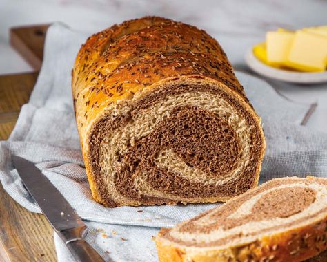 Two differently tinted doughs combine to create this beautifully spiraled Marbled Rye Bread loaf. Marbled Rye Bread Recipe, Marble Rye Bread Recipe, Rye Bread Recipe, Rye Sourdough, Rye Bread Recipes, Bread Loaf, Yeast Bread, Rye Bread, Bread Machine