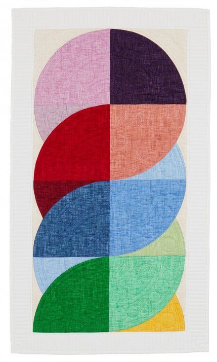 Color cascades down a graphic wall hanging made with curved piecing. #wallhanging #curvedblocks #americanpatchworkandquilting Drunkards Path Quilt, Wall Quilt Patterns, American Patchwork And Quilting, Quilt Modernen, Circle Quilts, Geometric Quilt, Rainbow Quilt, Patchwork Quilting, Wall Quilts