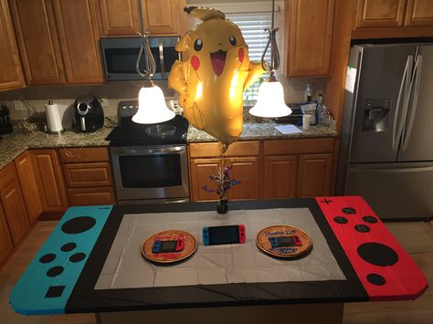 Nintendo switch party table I made. Nintendo Themed Party, Switch Theme Party, Switch Party Decorations, Nintendo Party Decorations, Super Smash Bros Party Decorations, Nintendo Switch Birthday Party Food Ideas, Nintendo Switch Party Decorations, Switch Party Ideas, Nintendo Birthday Party Ideas