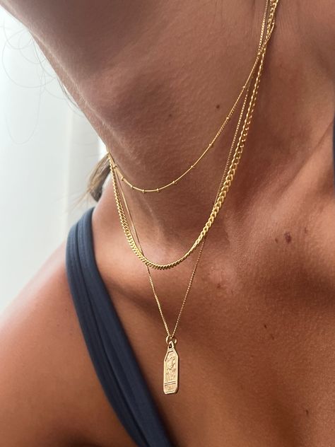 A new chain style in the Olaeda family! The most requested satellite chain is finally here. And, it's available in a choker and necklace length. Cheers to new beginnings. This chain will be a game changer to your layering stack. It's super dainty with an injection of texture and character. - 14k gold filled - Available in 15" & 16" long Gold Layered Chains, Daily Necklace Stack, Minimalist Necklace Stack, Gold Stack Necklace, Gold Necklace Stack Ideas, Dainty Gold Necklace Stack, Gold Chain Layering, Gold Necklace Combo, Gold Chain Stack