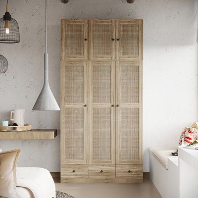 The rustic wardrobe has a super large capacity, 1 metal hanger, 8 open shelves, and 3 large drawers to meet your storage needs for clothes, quilts, and pillows. The spacious top can also accumulate your idle luggage, miscellaneous boxes, etc. The brown appearance with wood grain texture paired with rattan door panels makes this wardrobe more rustic, suitable for any furniture decoration environment！ | Beachcrest Home Armoire Brown 94.5 x 47.2 x 18.9 in, Wood | FFUG1411 | Wayfair Canada Entryway Armoire Ideas, Armoire In Nursery, Rustic Wardrobe, Rattan Door, Wood Armoire, Bedroom Makeup Vanity, Small Space Bedroom, Rattan Weave, Armoires & Wardrobes