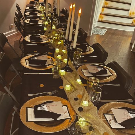 Fun 1920s Themed Birthday Party! A Murder Mystery with a private chef in your home - who could dream of more?! The moody lighting and the sparkle of gold had everyone in the Rip Roaring '20s mood. #localbusiness #smallbusinesslove #smallbusinesstips #womanownedbusiness #diy #decor #tabledecor #dinnerparty #holiday #giftbags #gifts #glenview #murdermystery #privatechef #1920s Roaring 20s Mystery Party, Roaring 20s Party Decorations Diy 1920s, Moody Birthday Party, Mystery Birthday Party, 1920s Party Decorations, Roaring 20s Party Decorations, 20s Theme Party, Nye Decor, 20s Party Decorations