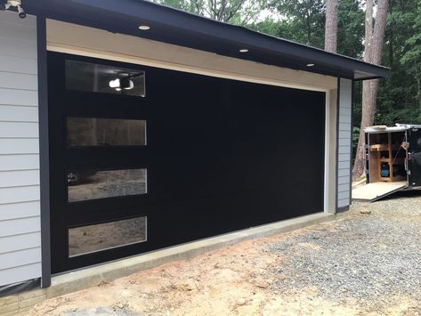 Garage Door With Glass Panel, Garage Doors With Glass Panels, Black Modern Garage Door, Flush Panel Garage Door, Barndominum Homes, Exterior Door Modern, Modern Garage Doors Ideas, Modern Garage Door, Home Entrance Door