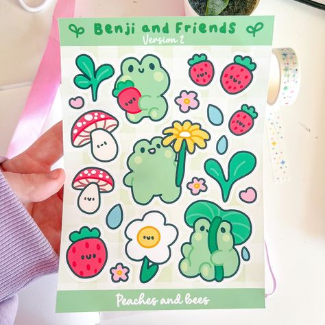 𝓓𝓮𝓼𝓬𝓻𝓲𝓹𝓽𝓲𝓸𝓷- ★These super cute Kawaii frog and friends sticker sheets are an adorable companion for your journal and Penpal letters!  ★This is my original design. ★ THESE ARE NOT 100% WATERPROOF! Do not submerge in water for a long period of time. -𝓢𝓲𝔃𝓲𝓷𝓰 𝓪𝓷𝓭 𝓜𝓪𝓽𝓮𝓻𝓲𝓪𝓵𝓼- ★Sticker sheet ★Matte premium paper peel-able Sticker ★Sticker sheet -𝓟𝓪𝓬𝓴𝓪𝓰𝓲𝓷𝓰- ★Stickers are packaged in a cello bag for protection. A layer of tissue paper will also consume the whole orde Kidcore Stickers, Sheet Packaging, Strawberry Frog, Penpal Letters, Frog Stickers, Homemade Stickers, Pen Pal Letters, Stickers Kawaii, Green Sticker