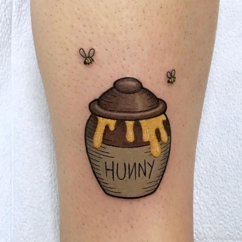 Ever wonder what sort of tattoos literary characters might get? We've come up with a few ideas. Honey Pot Tattoo Ideas, Hunny Pot Tattoo, Honeypot Tattoo, Winnie The Pooh Tattoo Ideas, Honey Pot Tattoo, Pot Tattoo, Winnie The Pooh Honey Pot, Pooh Tattoo, Winnie The Pooh Tattoos