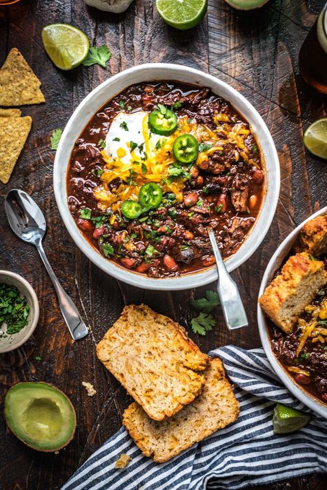 This Beef Chuck Chili is a game-changer, featuring melt-in-your-mouth beef, a perfect blend of spices, and a rich, complex sauce that'll have you coming back for seconds (and thirds!) Made with simple ingredients but big on taste, this chili is perfect for cozy nights in, game day parties, or anytime you need a comforting meal that delivers on flavor. Ready in about 3 hours with minimal hands-on time! Chuck Chili, Beef Chuck Steak Recipes, Shredded Beef Chili, Chuck Roast Chili, Chuck Steak Recipes, Beef Chuck Steaks, Sausage Chili, Steak Chili, Chuck Steak