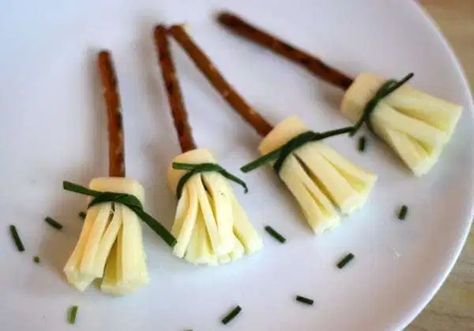 TODAY’S HEALTHY HALLOWEEN FOOD POST WAS MADE POSSIBLE BY PINTEREST. You’ve seen them, haven’t you? These adorable witches’ brooms made from string cheese, pretzels and chives? On this particular day, with the pressure of supplying the preschool snack falling squarely on my shoulders, I bravely tried to recreate one of the zillion wow-I-can’t-believe-other-moms-are-doing-this ideas from... Read More » Halloween Cooking, Healthy Halloween Food, Fall Eats, Halloween Snacks For Kids, Healthy Halloween Treats, Witches Broom, Healthy Halloween Snacks, Halloween Party Snacks, Preschool Snacks