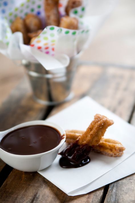 CHURROS WITH MEXICAN CHOCOLATE DIPPING SAUCE  or anyone who may not know what a churro is, it’s like a doughnut but long like a bread stick, and covered with a sugar and cinnamon coating. Did you know that they originated in Spain?   here are so many variations to this classic recipe so I decided that less is more and kept this recipe simple and pure. Mexican Chocolate Sauce, Chocolate Sauce Recipe, Chocolate Dipping, Chocolate Sauce Recipes, Sweet Fries, Chocolate Dipping Sauce, Churros Recipe, Mexican Chocolate, Mexican Dessert