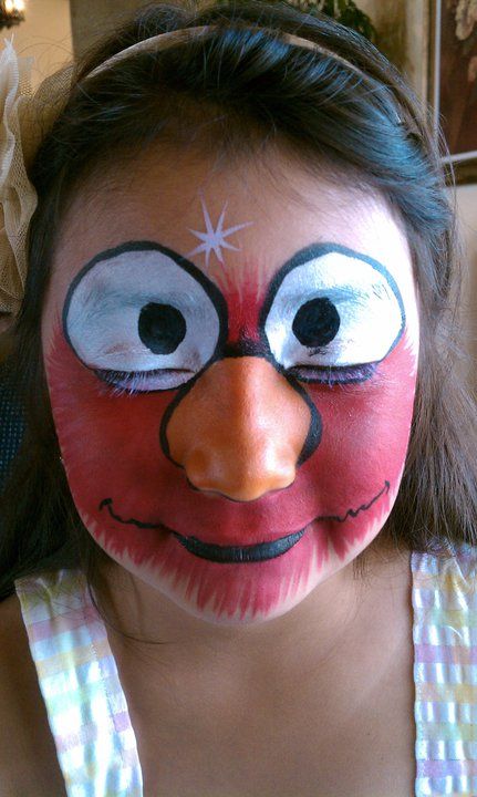 Elmo Face Painting by Okidoki Face Painting - www.okidokifacepainting.com Puppet Makeup, Elmo Face, Makeup Carnaval, Makeup Ide, Face Painting Ideas, Show Makeup, Face Painting Easy, Anime Makeup, Halloween Pumpkins Painted