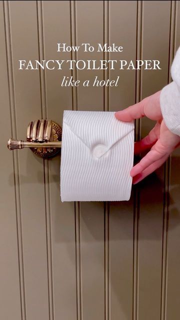 Interior Design | DIY | Decor on Instagram: "✨HOSTING TIP: How To Make Fancy Toilet Paper For Your Guest Bathroom✨ If you’re hosting throughout the holidays, this quick & easy styling tip will instantly make your guest bathroom look more high-end! HOW TO MAKE A TOILET PAPER WATER STAMP: 1️⃣Fold each corner of the toilet paper ends over one another (making two overlapping triangles) until you have one point. 2️⃣Turn your water faucet on and then off, and gently press the point you made onto th Toilet Paper Faucet Stamp, Hotel Toilet Paper Folding, Toilet Paper Origami, Hotel Housekeeping, Toilet Paper Art, Falling Waters, Wood Floor Cleaner, Toilet Room Decor, Bathroom Towel Decor