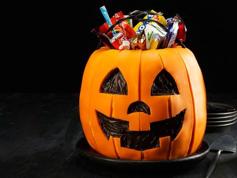 Candy Bucket Cake Recipe : Food Network Kitchen : Food Network - FoodNetwork.com Bucket Cake, Trick Or Treat Bucket, Dark Chocolate Frosting, Orange Food Coloring, Treat Bucket, Candy Bucket, Rolling Fondant, Food Network Magazine, Pumpkin Candy