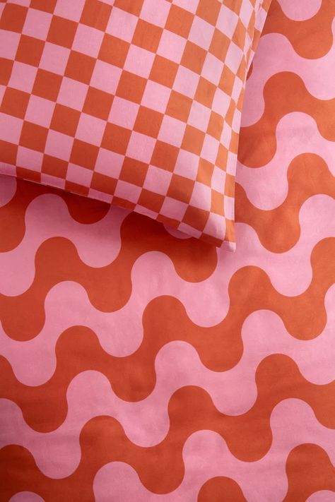 Organic cotton pink and orange retro wavy duvet cover and contrasting checkerboard pillowcases