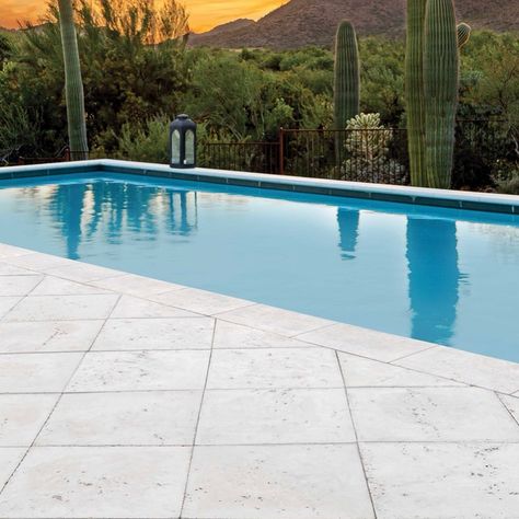 Pool Deck Tile Ideas, Concrete Pool Pavers, White Pavers Around Pool, Pool Concrete Colors, White Travertine Pool Deck, Concrete Around Pool Ideas, Pool Pavers Ideas, Pool Pavers And Coping, Concrete Pool Surround