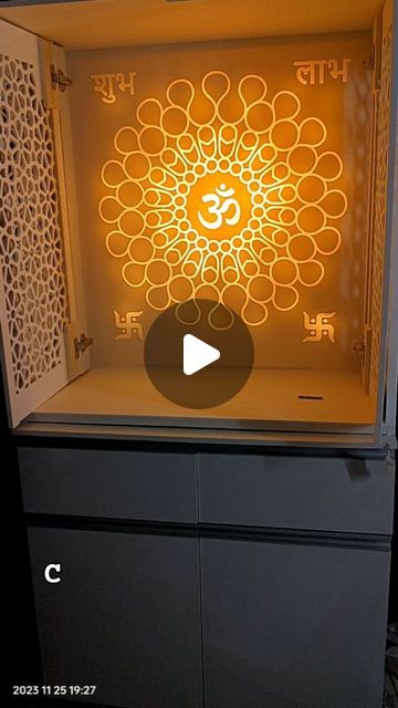 Pocket Door corian mandir with Backlit om corian backdrop and corian om side jhaali Temple Cnc Design For Home, Mandir Door Cnc Design, Mandir Door Design For Home, Acrylic Mandir, Corian Mandir Design, Mandir Interior, Corian Solid Surface, Mandir Design, Pooja Mandir