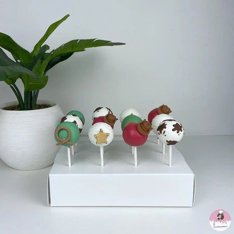 Custom cake pops for a My First Rodeo themed Party for a first birthday party Rodeo Cake Pops, My First Rodeo Party, My First Rodeo Cake, First Rodeo Cake, First Rodeo Party, Rodeo Cake, Rodeo Party, My First Rodeo, Custom Desserts