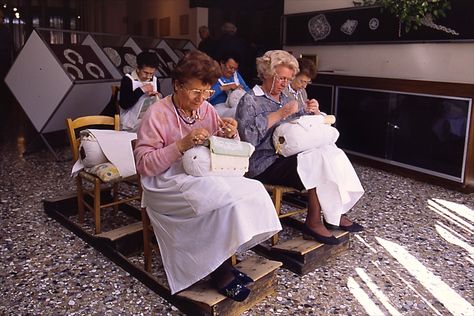 Burano lace makers.... I would love to have the honor of watching these amazing ladies work!   #monogramsvacation Jobs In Italy, Bobbin Lacemaking, Lace Painting, Mermaid Gifts, Linens And Lace, Needle Lace, Bobbin Lace, Lace Making, Dress Hats