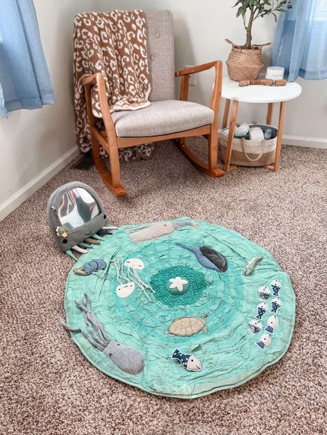 Ocean themed nursery Nursery Under The Sea, Nursery Ocean, Nursery Themes Neutral, Under The Sea Nursery, Tummy Time Toys, Baby Activity Mat, Coastal Nursery, Ocean Themed Nursery, Travel Nursery