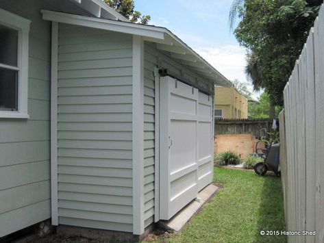 A rarely used side yard became a great place for ample storage with this 16' x 4' storage shed by Historic Shed.   The shed roofed unit fit perfectly under the eaves of this house and exposed rafter tails and traditional trim complemented the architecture.   6' Sliding barn doors allow access in a narrow area where swinging doors would be in the way. The double doors are made of cypress bead board and cypress trim.   The homeowners were able to free up space in their small backyard by… Side Yard Storage, Living Storage Ideas, Yard Storage, Storage Outdoor, Yard Sheds, Lawn Mower Storage, Backyard Storage Sheds, Lean To Shed, Side Yards