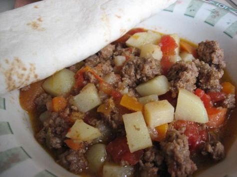 Caldillo -- South of the Border Stew, just yum. Every family has their own variation,  and it is a yummy go to meal. Latin Dishes, Green Chile Stew, Mexican Stew, Ancho Chili, Junior League, Stewed Potatoes, Fried Beef, South Of The Border, Beef Chuck