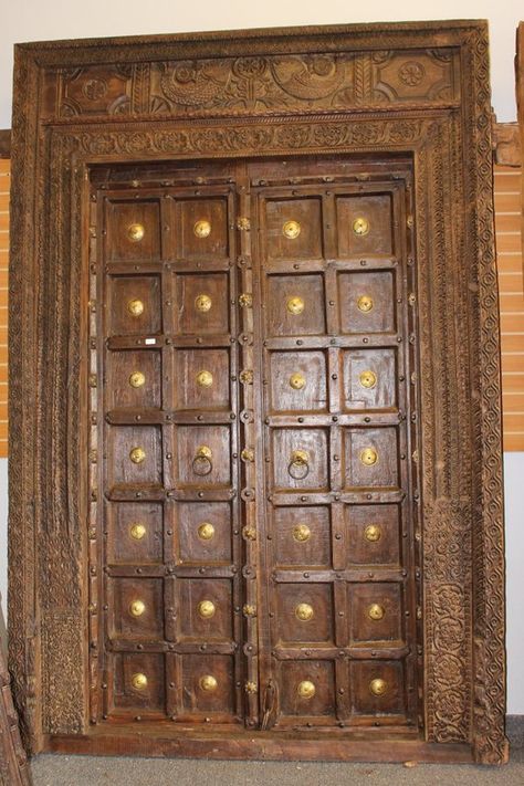 This is an amazing Elegant Royal Antique Indian doors with Frame are made in extremely strong teak wood with an old world patina of washed wood, the iron straps add rustic character and the grounding element. Carved Architecture, Indian Haveli, Hacienda Interior Design, Teak Door, Royal Doors, Luxury Architecture, Main Entrance Door Design, Wooden Front Door Design, Wooden Main Door