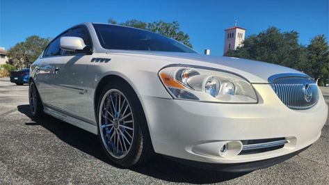 Featured on AutoHunter, the online auction platform driven by ClassicCars.com, is this 32k-Mile 2006 Buick Lucerne CXX.

In 2006, Buick sold about 240,000 vehicles. However, only one of those cars found fame (and fortune?) by being customized and featured at the country’s largest exhibition of automotive aftermarket manufacturers, called SEMA. This ex-show car is now being sold by a dealer in Winter Park, Florida, and the auction will end on Thursday. Weld Wheels, Winter Park Florida, Fame And Fortune, Buick Lucerne, Las Vegas Shows, Lucerne, Car Find, Winter Park, Car Culture