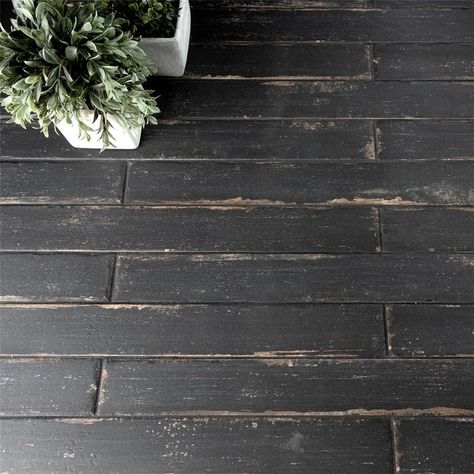 Merola Tile Retro Nero 2-3/4" x 23-1/2" Porcelain Floor and Wall Tile - Bed Bath & Beyond - 11669600 Tile And Dark Wood Floor Transition, Weathered Wood Floors, Farmhouse Style Tile Floors, Mismatched Tile Floor, Entryway Tile Floor Farmhouse, Old Farmhouse Floors, Speakeasy Flooring, Floor Tile With Dark Grout, Mud Room Floors