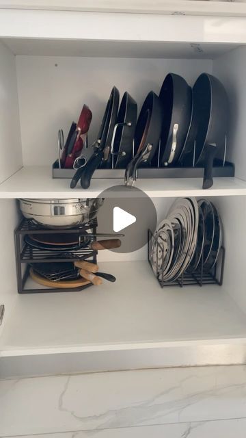 Minakshi Gajera on Instagram: "I picked up a perfect kitchen organiser to set up my pans and lids cabinet.  Using the right organizer for your pans, lids, and pots can significantly enhance your kitchen’s efficiency and aesthetics. It maximizes space, making it easier to access your cookware without the hassle of digging through stacks. An organizer protects your pots and pans from scratches, keeps your kitchen clutter-free, and speeds up your cooking process by having everything neatly in place. This small change leads to a more enjoyable and stress-free cooking experience, making your kitchen more inviting and functional.  For anyone wondering 🤔 Top shelf organiser is linked in my bio. Bottom shelf organisers are from Costco.  What is your biggest challenge with storing pans and lids? Pan Organizer Kitchen, Saucepan Storage Ideas, Pan Storage Ideas, Pots And Pans Organization, Kitchen Pans Organization, Kitchen Organisers, Pan Organizer, Kitchen Organiser, Pot And Pans Organization