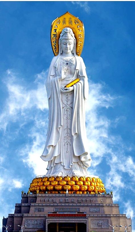 The Guanyin of Nanshan is a 108-metre (354 feet) statue of the bodhisattva Guanyin, sited on the south coast of China's island province Hainan near the Nanshan Temple of Sanya. This enormous statue boasts 3 different faces, each depicting different symbols and gestures. As of August 2018, this is the twelfth tallest statue in the world and the tallest statue of Guanyin in the world. The statue took six years to build and was enshrined on April 24, 2005. #AmazingSculptures #Guanyin Guanyin Goddesses, Bodhisattva Guanyin, Beautiful Statues, Buddha Temple, Quan Yin, Chinese Embroidery, Kuan Yin, Buddha Sculpture, Kwan Yin