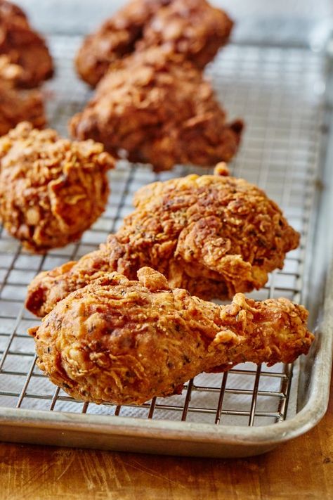 How To Make Homemade Crispy, Juicy Fried Chicken (That’s Better Than KFCs Original Recipe). This easy copycat recipe makes the BEST southern Kentucky style soul food. Serve it on a sandwich or at a picnic. Use Breast, Thighs, and drumsticks and a dry brine for ultimate flavor. You'll need buttermilk, spices, bone-in chicken, vodka, egg whites, flour, and a few more ingredients. Simple step by step photos make this easy! Fried Chicken Recipe With Cornstarch, Extra Crispy Fried Chicken Recipe, Extra Crispy Fried Chicken, Crispy Fried Chicken Recipe, Making Fried Chicken, Buttermilk Chicken, Fried Chicken Recipe, Crispy Fried Chicken, Savory Chicken