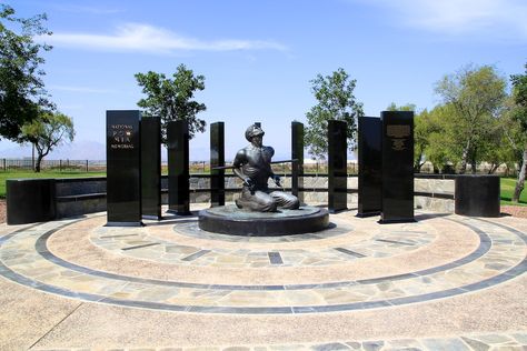 The Prisoner of War/Missing in Action Memorial was designated a National Memorial by the U.S. Congress and dedicated September 16, 2005. A bronze statue, sculpted by Vietnam veteran Lewis Lee Millett, Jr. is the image of an American serviceman on his knees and bound by his captors. The statue is surrounded by black marble pillars, representing imprisonment. The memorial honors the over 607, 000 U.S. prisoners of war and 170,000 servicemen and women listed as missing in action since the Revol... Memorial Architecture Design, Memorial Park Design, Memorial Architecture, Triangle Park, Memorial Design, Marble Pillar, On His Knees, Statue Base, Missing In Action