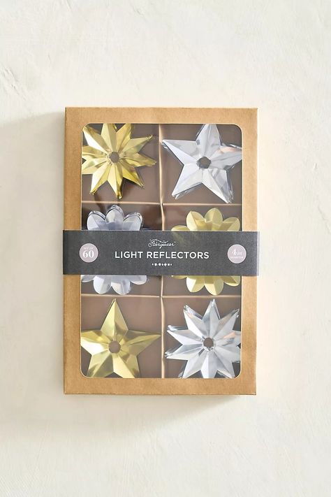 Stargazer Light Reflectors, Set of 60 | Anthropologie Christmas Tree Light, Gold Starburst, Tree Light, Christmas Interiors, Creative Living, Hand Poured Candle, Christmas Tree Lighting, Silver Flowers, Gold Flowers