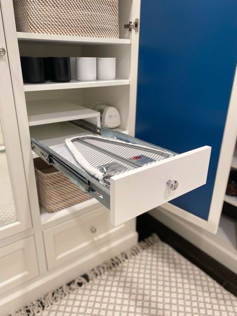 The genius hack to truly hide your folding ironing board! Avoid the standard ironing board cabinet & go with a hidden built in ironing board drawer pull out! 👉Click to get the details + our FREE Room Design Guide! #hiddenironingboard #builtinironingboard #ironingboardcabinetstorage #foldingironingboardideas #pulloutironingboarddrawer #ironingboardindrawer #folddownironingboard #foldoutironingboard #hideawayironingboard #ironingboardstoragehidden #ironingboardstoragecabinet Ironing Cupboard Storage Ideas, Laundry Room With Pull Out Folding Table, Pocket Ironing Board, Storage Ironing Board, Ironing Board In Closet Built Ins, Master Closet Ironing Board, Cupboard With Ironing Board, Laundry Room Ironing Board Cabinet, Recessed Ironing Board Built Ins