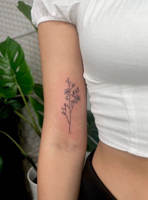 Stem Of Flowers Tattoo, Instagram Bio Ideas With Age, Arm Tatooes Ideas Woman, Flower Tattoos For Women Arm, Consider The Wildflowers Tattoo, Arm Flower Tattoos For Women, Forget Me Not Flowers Tatoos, Tiny Wrist Tattoos For Women, Simple Floral Tattoo