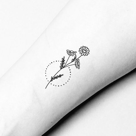 Looking for a tattoo that's more than just skin deep? Discover 17 meaningful tattoo ideas that will speak to your soul and leave a lasting impression. From powerful symbols to personal mantras, these designs are sure to inspire your next ink adventure. Here are 17 Meaningful Tattoo Ideas for Women That Will Leave You Inspired and Inked. Simple Daisy Tattoo Outline, Daisy Simple Tattoo, Dainty Daisy Tattoo Simple, Small Wildflower Tattoo Simple, Tattoo Daisies, Simple Outline Tattoo, August Tattoos, Ankle Flower Tattoo, Floral Wrist Tattoo