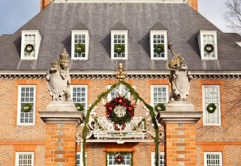 wreaths-on-windows-getty-1120 How To Hang Wreaths On Windows, Colonial Williamsburg Va, Christmas Outdoors, Exterior Windows, Williamsburg Christmas, Williamsburg Va, How To Hang, Hanging Wreath, Colonial Williamsburg