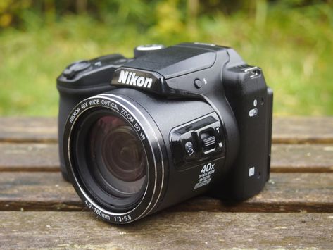 Launched in Spring 2016 the Nikon COOLPIX B500 is a budget super-zoom with a 16 Megapixel sensor and a 40x stabilised optical zoom. Although it lacks PASM exposure modes, to call it a point-and-sh Photo Bridge, Nikon Coolpix B500, Coolpix B500, Exposure Compensation, Nikon Coolpix, Canon Powershot, Focal Length, Binoculars, Nikon